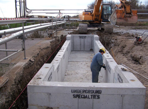 Worker standing in concrete form